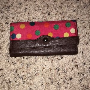 Buttoned hand wallet